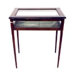 Edwardian mahogany inlaid bijouterie display cabinet, the hinged top over glazed panels and upon