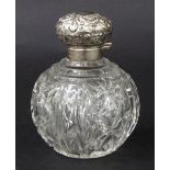 Cut glass globular scent bottle with an applied silver repousse cover, glass stopper, Birmingham