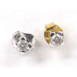 Pair of white metal solitaire ear studs, 0.10ct approx (133731-3-A)