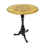 Victorian figured and burr walnut tripod table, the oval top upon an ebonised pillar support and