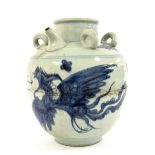 19th century Chinese blue and white porcelain wine jar, decorated to the sides with a dragon chasing