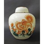 Chinese porcelain ginger jar and cover, decorated with a large mythical beast/dragon chasing the