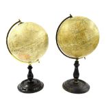 Geographia 8" terrestrial table globe, on a turned ebonised base, 15" high; also a Phillips 8"