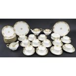 Noritake tea set for twelve decorated with floral sprays and gilding comprising cups with saucers,