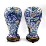 Pair of Chinese cloisonne baluster vases, with blue floral design, 14.5" high, upon hardwood