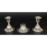 Pair of silver squat candlesticks, Birmingham 1973, 3.75" high; together with an EPNS capstan