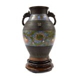 Bronze champleve vase, with elephant mask handles, chrysanthemum design, 12.5" high, wooden base
