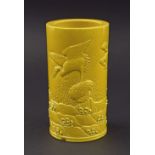 Chinese yellow ground cylindrical porcelain vase, decorated in low relief with a crane in a