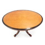 Fine Victorian amboyna and ebony banded oval centre table, supported upon four tapering fluted