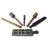 Assorted treen items to include two large pestles, priest, mould, cribbage board and another
