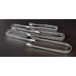Five pairs of Georgian silver sugar tongs with bright-cut decoration, various hallmarks, 5.3oz