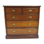 Edwardian walnut chest of drawers, the moulded top over two short and three long graduated drawers