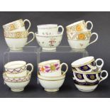 New Hall - six tea bowls/cups with coffee cups in pattern nos. 736, 317, U561, 238, 353 and 362 (