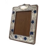 Good large Art Nouveau silver and enamel photograph frame, the stylised surround decorated in low