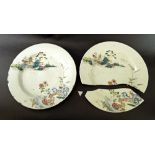 Pair of 18th century Chinese porcelain chargers, decorated with pagoda landscapes in famille rose,