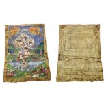 Three Tibetan Thangkas, two painted on silk, the other on canvas, largest measuring 18" x 13.5" (3)