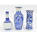Chinese export blue and white baluster porcelain vase, decorated in the Kangxi manner with