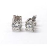 Fine pair of 18k white gold diamond ear studs, round brilliant-cut, each 0.90ct *with GIA laser