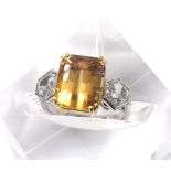 Good unusual 18ct white gold yellow topaz and diamond three stone ring, the emerald-cut topaz 5.32ct