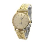 Omega De Ville gold plated and stainless steel lady's bracelet watch, champagne dial with baton