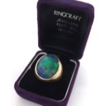Gentleman's large 9ct doublet black opal ring, 25.6gm, 24mm wide, ring size U-/T, box