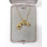 Van Cleef & Arpels 18k yellow gold bow design pendant on necklet, set with diamonds, emeralds,
