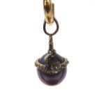 Unusual black cultured pearl gold pendant, fashioned with entwined serpents set with rose diamonds