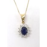 Sapphire and diamond 9ct oval cluster pendant on chain, 2.4gm, pendant 23mm x 12mm