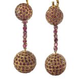 Large pair of ruby set yellow metal pendulum drop earrings, Omega backs, 37.7gm, drop 66mm
