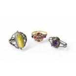Antique ring set with seven rough-cut ruby and four diamond stones, ring size J; also two white