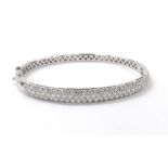 Pave set diamond white gold hinged bangle, 21.1gm, 65mm wide