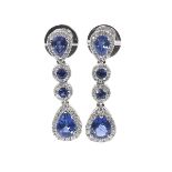 Attractive pair of 18ct white gold sapphire and diamond drop earrings, each with four pear and round