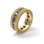 Jacob & Co. 18k blue and yellow sapphire band ring, signed, ref. 91224211, band width 8.5mm, 13.2gm,