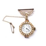 Swiss 18k seed pearl fob watch on a similar 9ct brooch, white dial within a pearls set bezel,