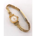 Omega gold plated lady's bracelet watch, the silvered dial with baton markers, mechanical