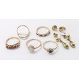Four assorted 9ct stone set dress rings, 9ct wishbone ring, pair of 9ct earrings and a pair of