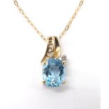 Topaz and diamond 9ct pendant on chain, 2.2gm, pendant 18mm