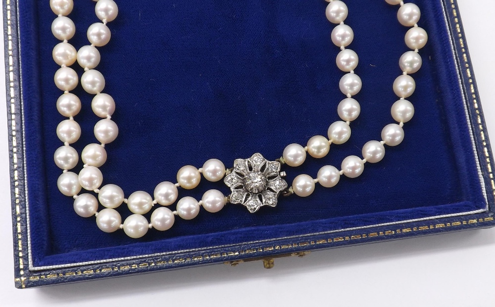 Fine quality double row of cultured pearls, graduating from 6.6mm to 9.6mm, floral white metal - Image 2 of 2