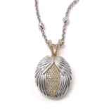 Theo Fennell, London 18k yellow and white gold oval diamond set locket on necklet, pave round