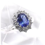 Impressive large tanzanite and diamond 18ct white gold oval cluster ring, the tanzanite estimated