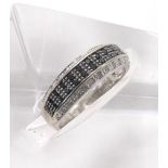 Black and white diamond 9ct white gold band ring, 0.33ct approx, width 6.5mm, ring size O-