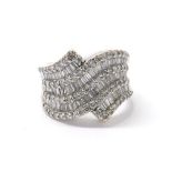 18k white gold diamond set abstract ring, set with a selection of baguette and round brilliant-cut