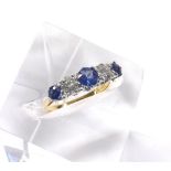 Antique style 18ct yellow and white gold sapphire and diamond five stone claw set ring, with three
