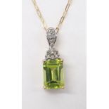 Peridot and diamond 9ct pendant on chain, pendant 16.5mm x 6mm