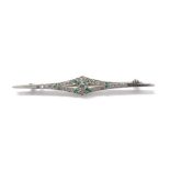 Attractive white gold emerald and diamond set bar brooch, the principal diamond 0.10ct approx, in