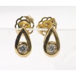 Pair of 18k yellow gold teardrop diamond ear studs, round brilliant-cut, 0.20ct approx, 9mm