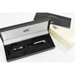 MontBlanc 'Starwalker' ballpoint pen, 5.5" long, cased and with service guide within card sleeve