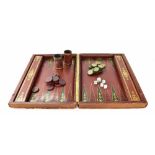 Large attractive tooled leather backgammon box, with original shakers and counters