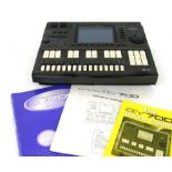 Yamaha QY700 music sequencer, with various instruction manuals