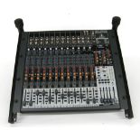 Behringer Xenyx X2442 USB 24 channel studio mixer, fitted onto a studio rack stand, boxed